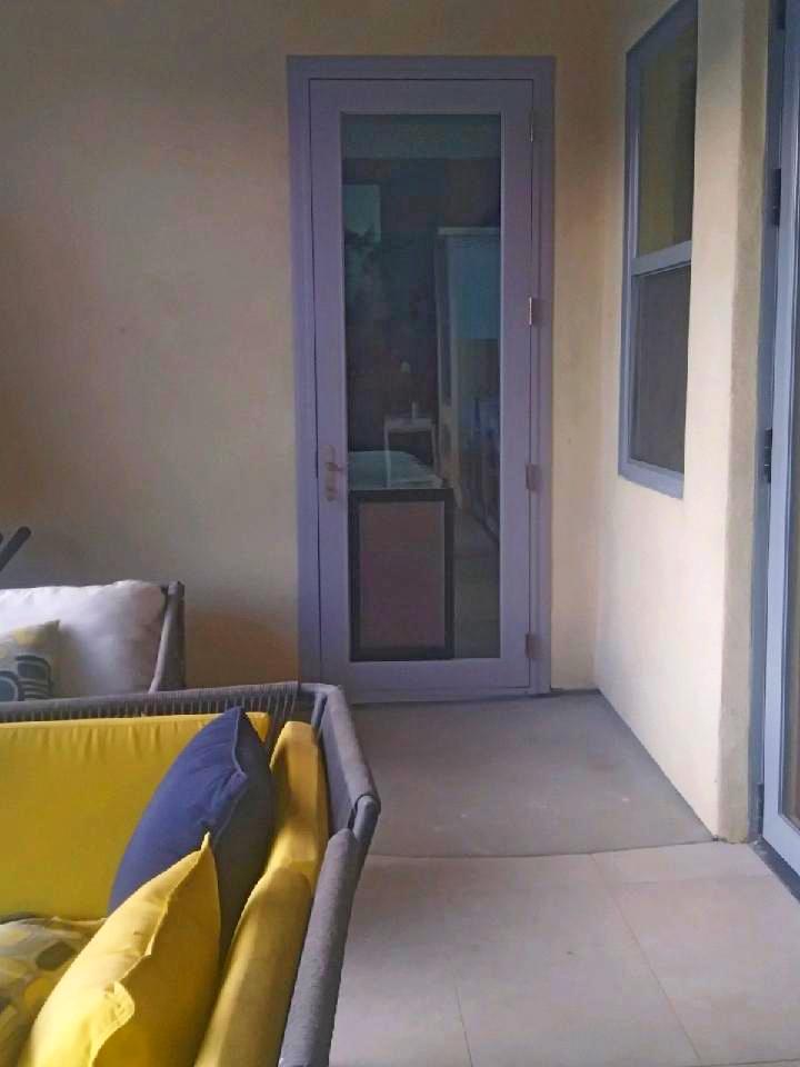French Swing Door with a Pet Door Project in Palm Springs After