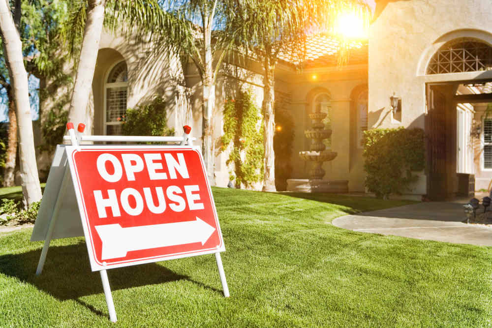 House for sell with open house sign (Should I Replace My Windows Before Selling My Home)